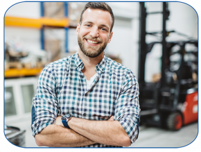 male forklift operator crossed arms smiling at camera